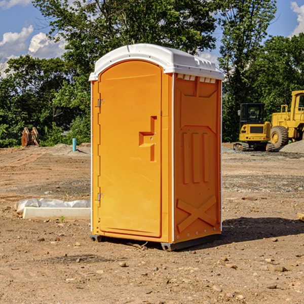 what is the cost difference between standard and deluxe portable restroom rentals in Fillmore County NE